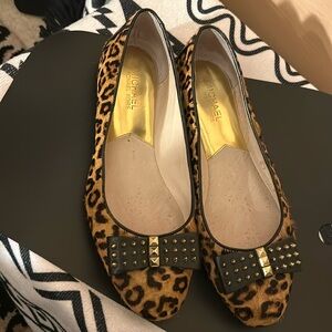 Michael Kors, leopard designed shoes, size 8 for $25.00, excellent condition.